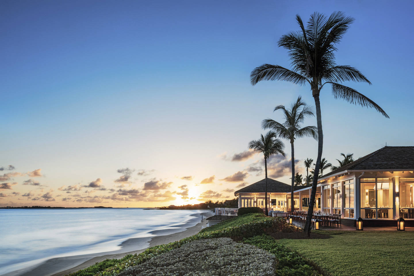 sunset view of water and hotel