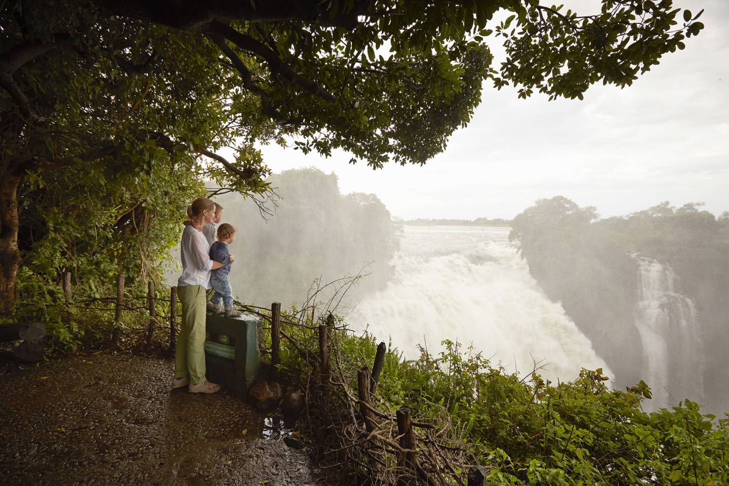 mother and son at waterfall overlook