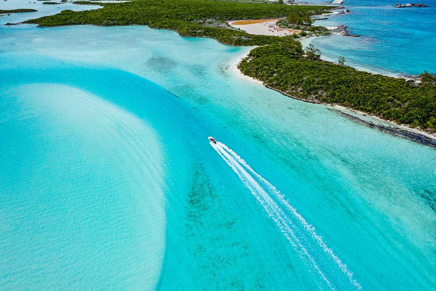 aerial view of boat in tropical waters